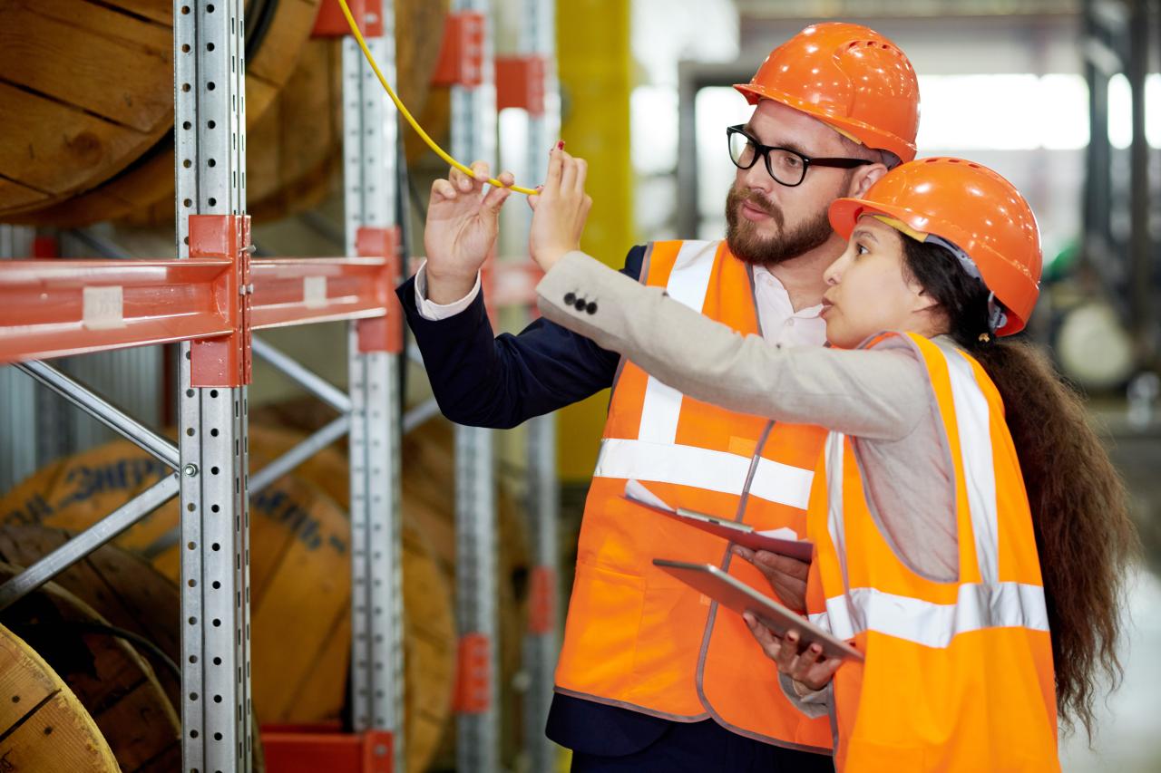 workers wearing orange protective hats