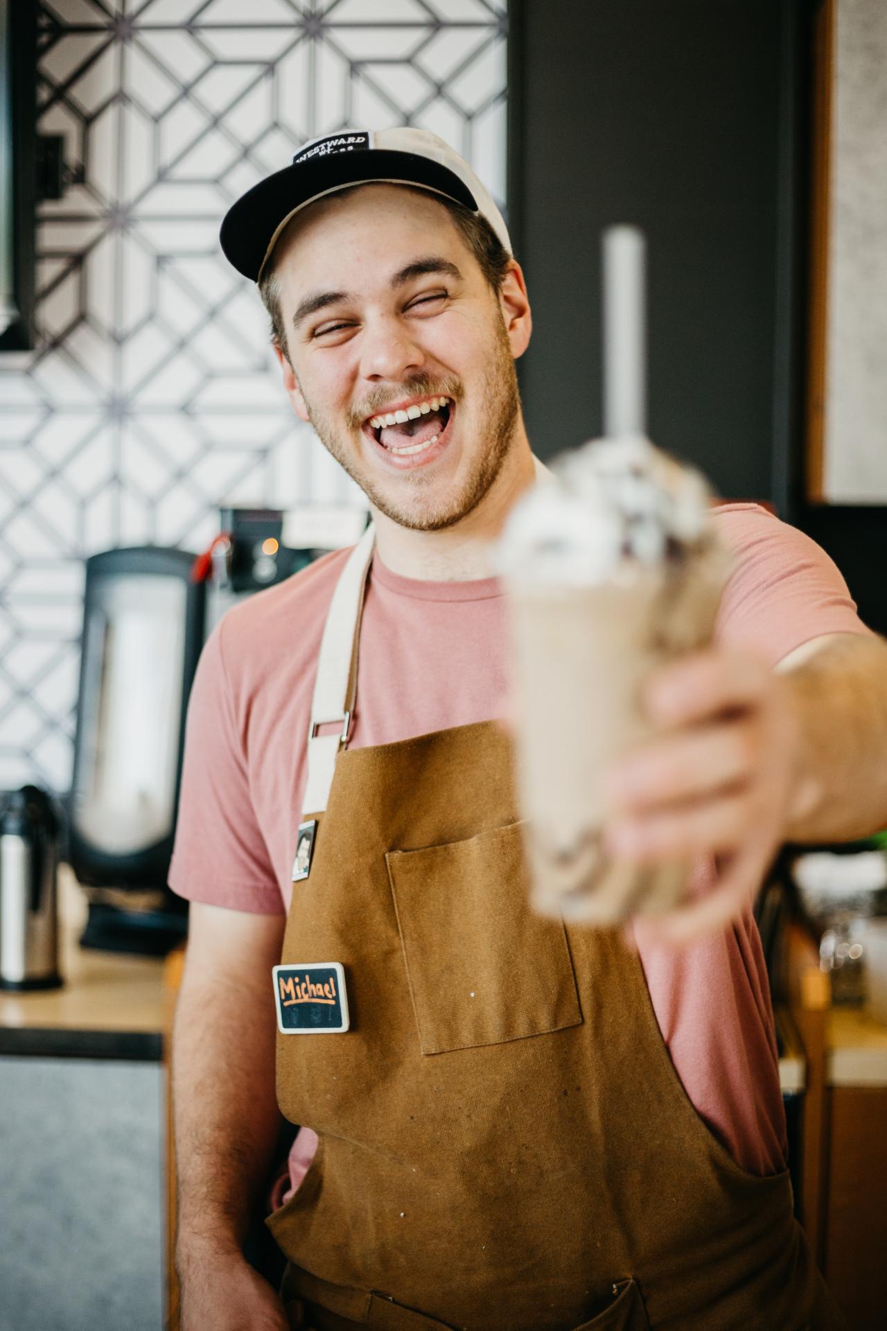 worker holding a drink