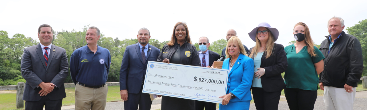 AG James presenting a check for park rehab