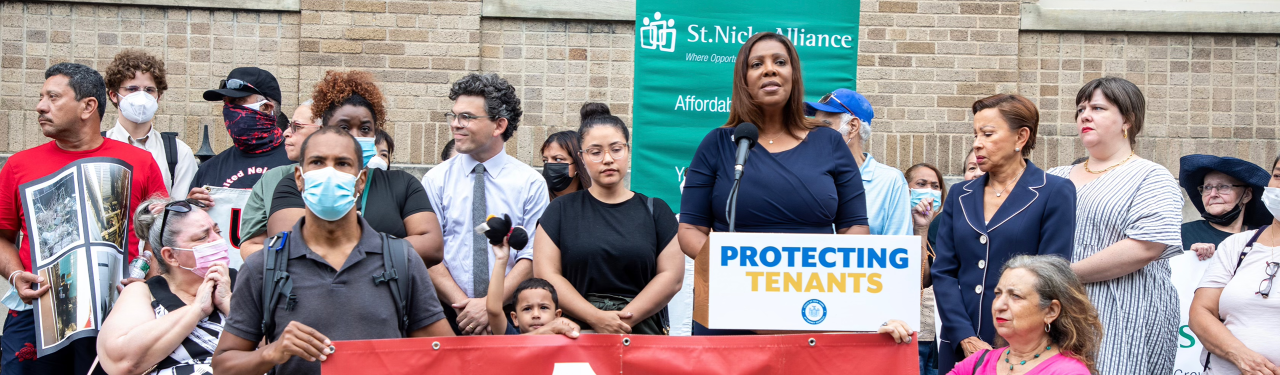 AG James at a podium with a sign that reads protecting tenants